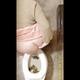 A hidden ceiling cam looks straight down into public restroom stalls as several different women pull down their pants and shit. Multiple scenes. Brown water and poop are seen in the bowl in later scenes. Vertical format video. Over 10 minutes.